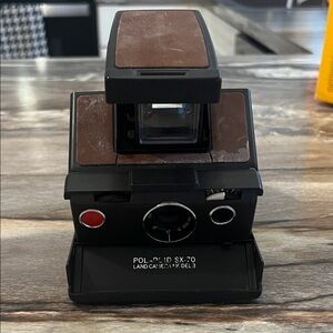 Vintage Polaroid SX-70 camera with Pink, Orange, Yellow, Green and Blue  Graphic